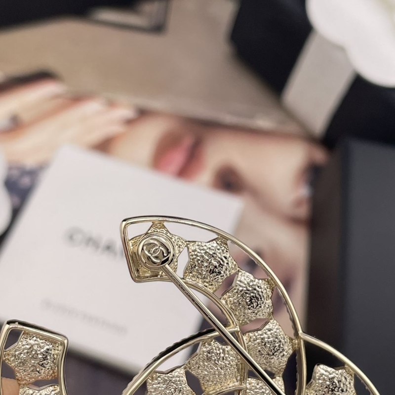 Ch**el brooches